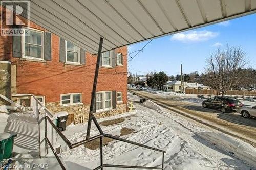 Brick exterior with stone veneer foundation - 37 Wellington Street, Cambridge, ON 