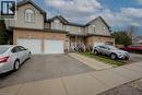 Brick and siding exterior with arched windows - 53 Prosperity Drive, Kitchener, ON  - Outdoor With Facade 