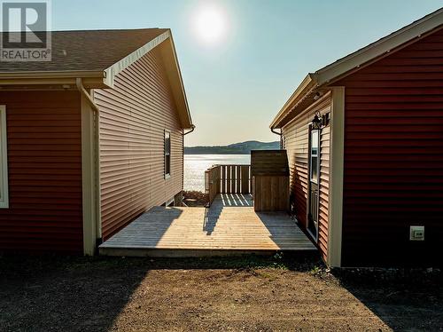 deck between house and garage - 8, 8A, 10 Main Street, Twillingate, NL 