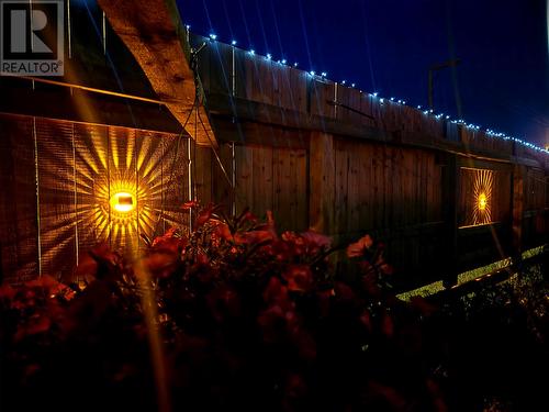 fence at night - 8, 8A, 10 Main Street, Twillingate, NL 