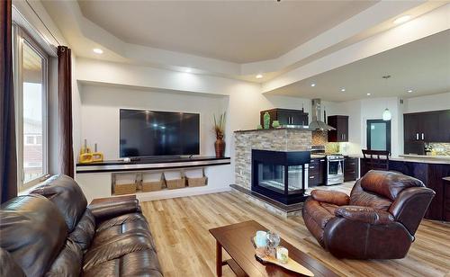103 Robert Koop Road, Landmark, MB - Indoor Photo Showing Living Room With Fireplace