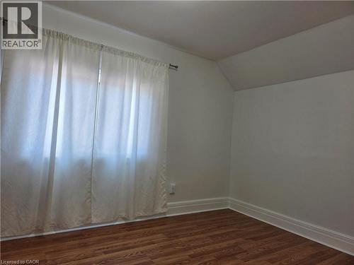 Room featuring light-toned walls and wood-finish flooring - 125 Cavell Avenue, Hamilton, ON - Indoor Photo Showing Other Room