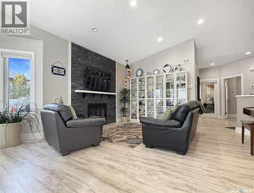 623 Highland Drive, Swift Current, SK - Indoor Photo Showing Living Room With Fireplace