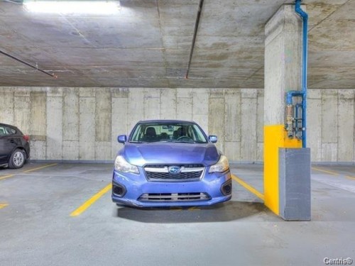Garage - 802-1900 Rue Émile-Martineau, Laval (Laval-Des-Rapides), QC - Indoor Photo Showing Garage