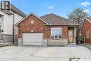 Brick exterior with stone accents and a gabled roofline - 704 Stone Church Road E, Hamilton, ON  - Outdoor 