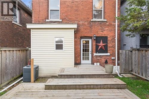 Multi-level wood deck provides exterior access - 104 Barnesdale Avenue N, Hamilton, ON - Outdoor With Exterior