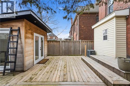 Expansive wood-finish decking with multiple levels - 104 Barnesdale Avenue N, Hamilton, ON - Outdoor With Deck Patio Veranda With Exterior