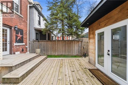 Expansive wood deck with tiered steps - 104 Barnesdale Avenue N, Hamilton, ON - Outdoor With Deck Patio Veranda With Exterior