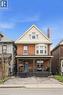 Brick exterior featuring a covered front porch and second-story bay window - 104 Barnesdale Avenue N, Hamilton, ON  - Outdoor With Deck Patio Veranda With Facade 