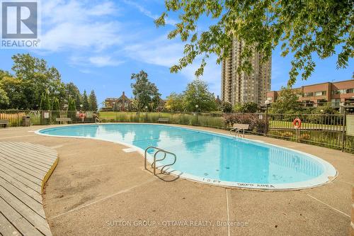 314 - 270 Brittany Drive, Ottawa, ON - Outdoor With In Ground Pool With Backyard