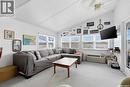 57 Sebolt Bay, Lumsden Beach, SK  - Indoor Photo Showing Living Room 