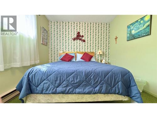 492 Fourth Avenue, Midway, BC - Indoor Photo Showing Bedroom