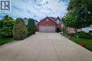 Brick exterior residence featuring an attached garage with a panel door - 146 Locheed Drive, Hamilton, ON  - Outdoor 