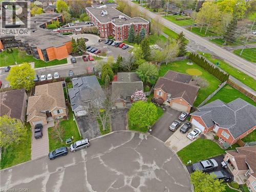 Aerial perspective showcasing a residential area with varied housing styles - 29 Strong Court, Brantford, ON - Outdoor With View