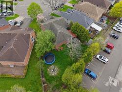 Expansive aerial property image featuring multiple residential structures and mature landscaping - 