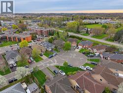 Residential cul-de-sac layout with diverse single-story and multi-story homes - 