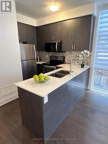 9 - 11 Eldora Avenue, Toronto, ON - Indoor Photo Showing Kitchen With Stainless Steel Kitchen With Double Sink With Upgraded Kitchen