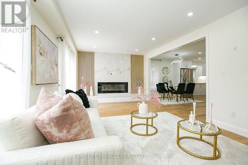52 Foxacre Row, Brampton, ON - Indoor Photo Showing Living Room With Fireplace