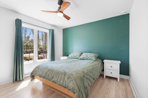 Master Bedroom - 18 Rue Ogilvy E., Saint-Hippolyte, QC - Indoor Photo Showing Bedroom