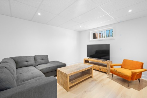 Family Room - 18 Rue Ogilvy E., Saint-Hippolyte, QC - Indoor Photo Showing Living Room