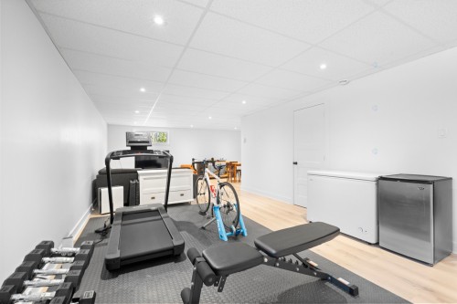 Family Room - 18 Rue Ogilvy E., Saint-Hippolyte, QC - Indoor Photo Showing Gym Room