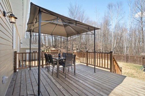Balcony - 18 Rue Ogilvy E., Saint-Hippolyte, QC - Outdoor With Deck Patio Veranda With Exterior