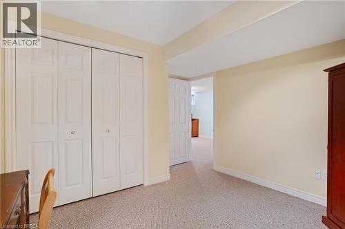 Neutral-toned walls complement the light-colored carpeting - 422 Powerline Road Unit# 10, Brantford, ON - Indoor