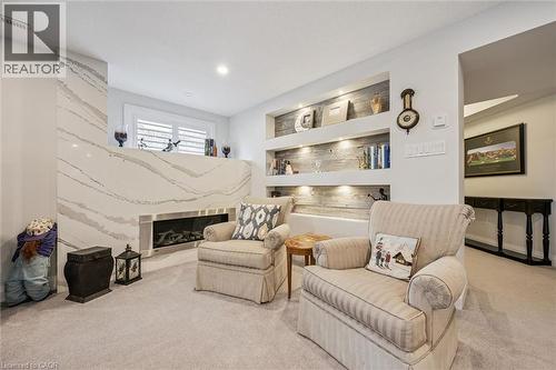 254 Gosling Gardens Unit# 20, Guelph, ON - Indoor With Fireplace