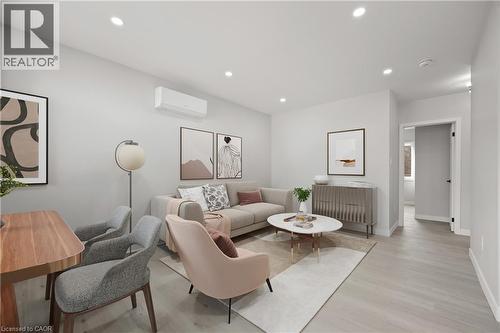 Digitally staged photo - 1180 Union Street, Kitchener, ON - Indoor Photo Showing Living Room