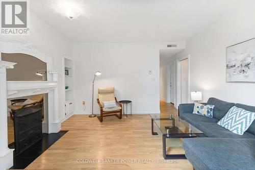 308 - 460 Wellington Street, London East (East F), ON - Indoor Photo Showing Living Room With Fireplace