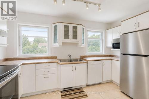 Virtually Decluttered - 223 Sanford Avenue, Ottawa, ON - Indoor Photo Showing Kitchen With Double Sink