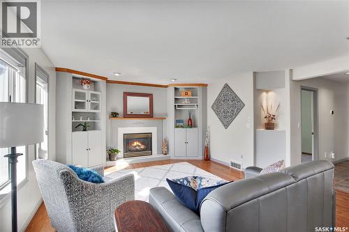 114 Woods Court, Saskatoon, SK - Indoor Photo Showing Living Room With Fireplace