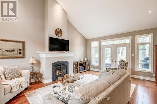 20 Mourning Dove Trail, Tiny, ON - Indoor Photo Showing Living Room With Fireplace