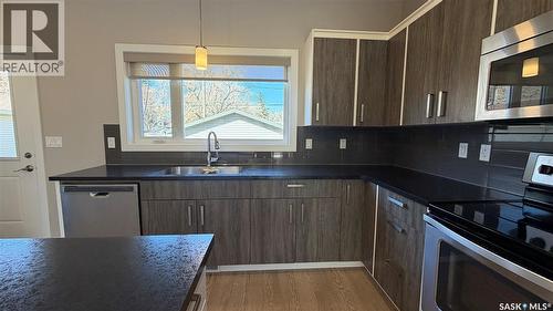 2212 St Patrick Avenue, Saskatoon, SK - Indoor Photo Showing Kitchen With Double Sink