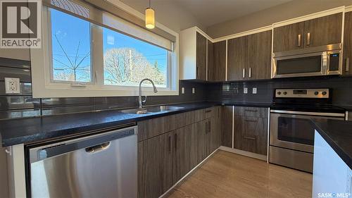 2212 St Patrick Avenue, Saskatoon, SK - Indoor Photo Showing Kitchen With Double Sink