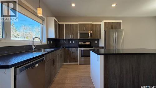 2212 St Patrick Avenue, Saskatoon, SK - Indoor Photo Showing Kitchen With Double Sink