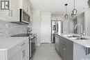 3181 Mazurak Crescent, Regina, SK  - Indoor Photo Showing Kitchen With Stainless Steel Kitchen With Double Sink With Upgraded Kitchen 