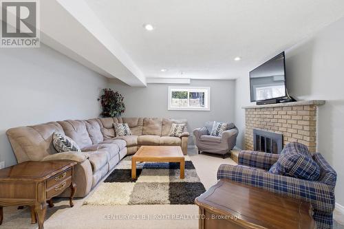 4113 Taffey Crescent, Mississauga, ON - Indoor Photo Showing Living Room With Fireplace