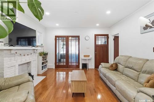310 8Th Street E, Saskatoon, SK - Indoor Photo Showing Living Room With Fireplace