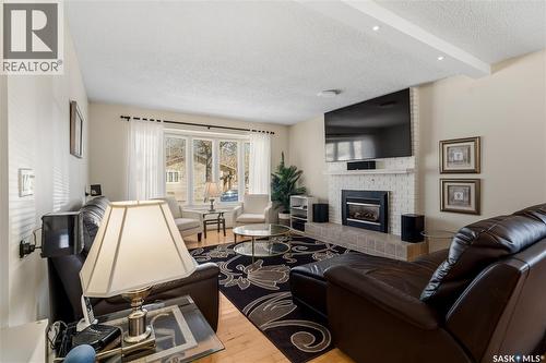 6 Selkirk Crescent, Regina, SK - Indoor Photo Showing Living Room With Fireplace
