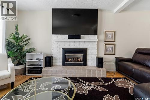 6 Selkirk Crescent, Regina, SK - Indoor Photo Showing Living Room With Fireplace