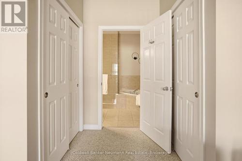 Dual Primary Closets - 21 - 50 Bryan Court, Kitchener, ON - Indoor Photo Showing Other Room
