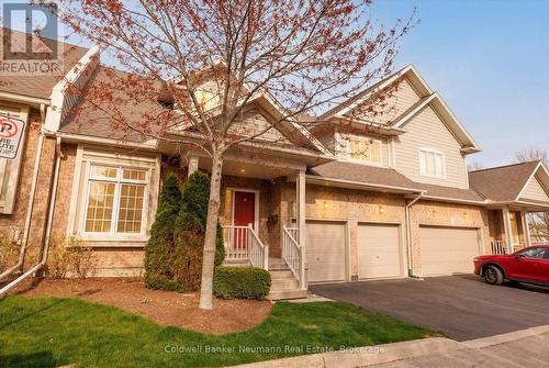 Front Exterior with Double Garage Bays - 21 - 50 Bryan Court, Kitchener, ON - Outdoor With Facade
