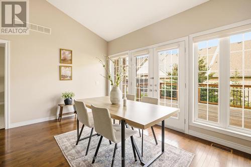 Dining Room with large window wall - 21 - 50 Bryan Court, Kitchener, ON - Indoor Photo Showing Dining Room