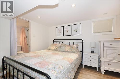 This room is plumbed for a kitchen and can be converted back as part of the potential in-law setup. - 123 Samuel Street, Kitchener, ON - Indoor Photo Showing Bedroom