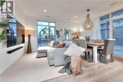 Living room featuring recessed lighting and light wood-type flooring - 50 Grand Avenue S Unit# 602, Cambridge, ON - Indoor