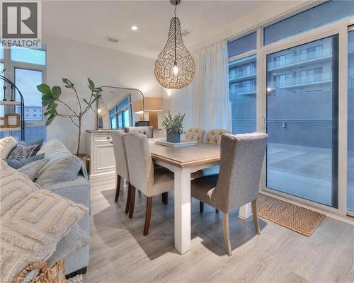 Dining area with light wood finished floors and recessed lighting - 50 Grand Avenue S Unit# 602, Cambridge, ON - Indoor Photo Showing Dining Room