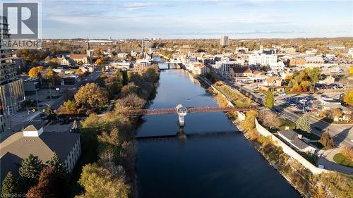 Aerial view of property and surrounding area with a large body of water and a notable bridge - 50 Grand Avenue S Unit# 602, Cambridge, ON - Outdoor With Body Of Water With View