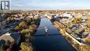 Aerial view of property and surrounding area with a large body of water and a notable bridge - 50 Grand Avenue S Unit# 602, Cambridge, ON  - Outdoor With Body Of Water With View 