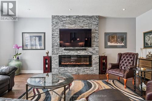 29 - 254 Gosling Gardens, Guelph (Clairfields/Hanlon Business Park), ON - Indoor Photo Showing Living Room With Fireplace